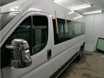 White bus fixed side glass