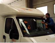 Fixing front glass of a van